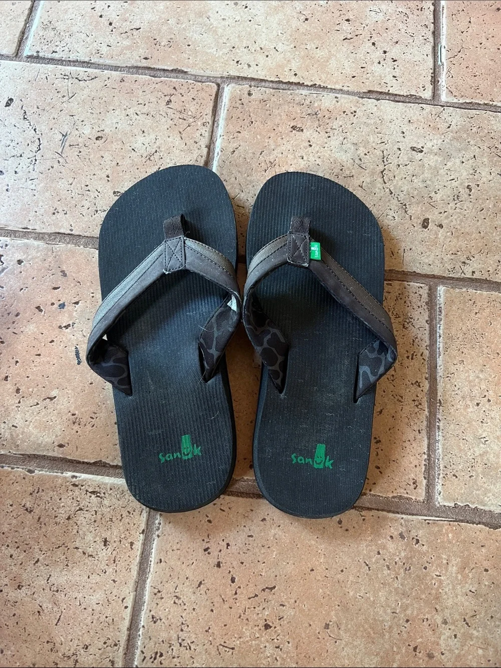 Sanuk Black Flip Flops with Green Logo Accent